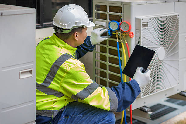 Professional Air Conditioning Repair technician working in Plainview, MN